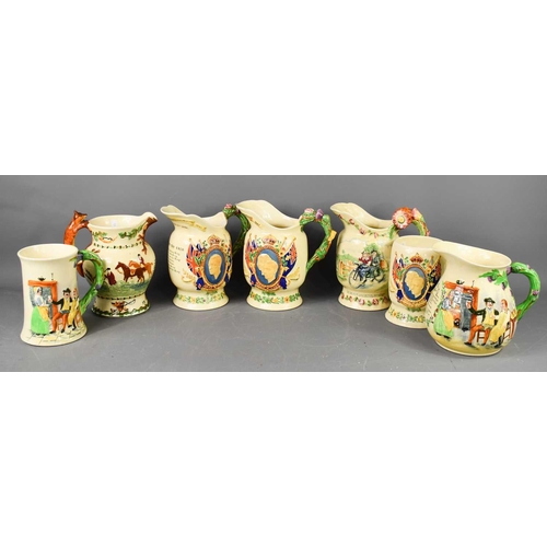 161 - A group of Crown Devon commemorative and musical jugs, to include Auld Lang Syne, Edward VIII and Ki... 