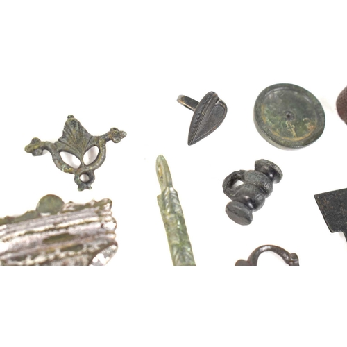 332 - A group of metal detecting finds to include a Celtic toggle, Posy ring dated 1929, strap end, thimbl... 