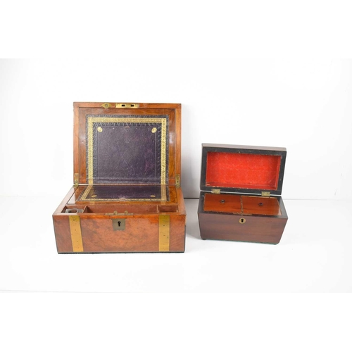 72 - A Victorian walnut and brass bound writing box opening to reveal a leather writing surface pen and i... 