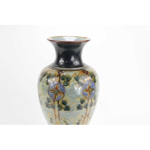 10 - Eliza Simmance for Royal Doulton: A large baluster form vase, blue ground with stylised floral round... 