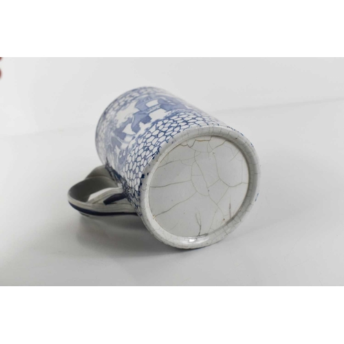 107a - An early English blue and white transfer printed tankard, possibly 18th century, of cylindrical form... 