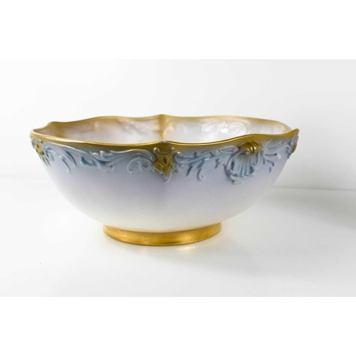 133 - A Royal Worcester bowl, numbered 1522 to the base, red puce mark, together with a Royal Worcester fl... 