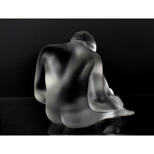 151 - A Lalique frosted glass paperweight figure 'Reve', in the form of a seated nude with one knee up, si... 