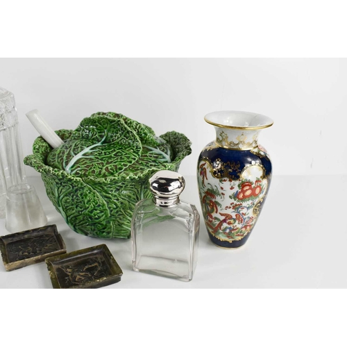 157 - A pair of antique cut glass decanters with the original stoppers, together with a silver topped glas... 