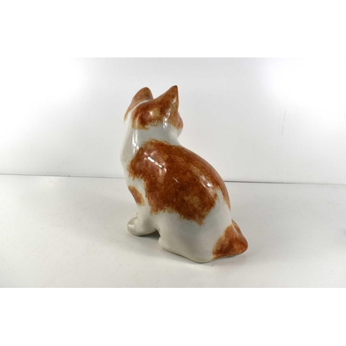 183 - Two Winstanley porcelain ginger cats, comprising a cat and a kitten, both signed under, 22 and 10.5c... 