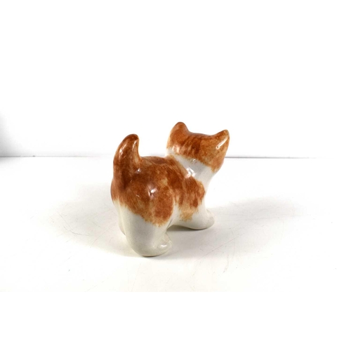 183 - Two Winstanley porcelain ginger cats, comprising a cat and a kitten, both signed under, 22 and 10.5c... 