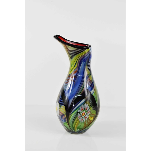 185 - A Studio Art glass vase, likely Murano, made up of multi-layered coloured canes and abstracted mille... 