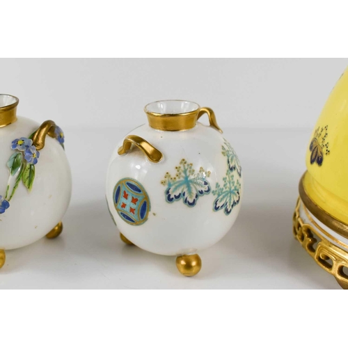 197 - A group of Royal Worcester to include three aesthetic movement vases, and one Chinoiserie example wi... 