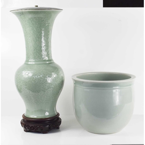 227 - A large 20th century celadon vase, raised on a wooden plinth and converted into a lamp base, togethe... 