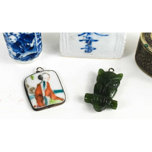 235 - A selection of Chinese collectables to include two blue and white scent bottles, a metal snuff box, ... 