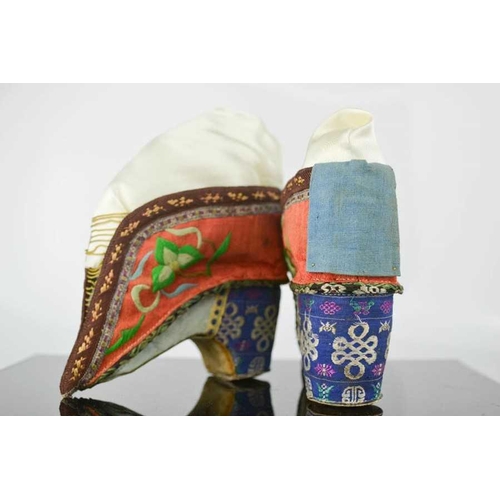 270 - A pair of Chinese bound feet shoes or 'lotus shoes', late Qing Dynasty, circa 1900, hand embroidered... 