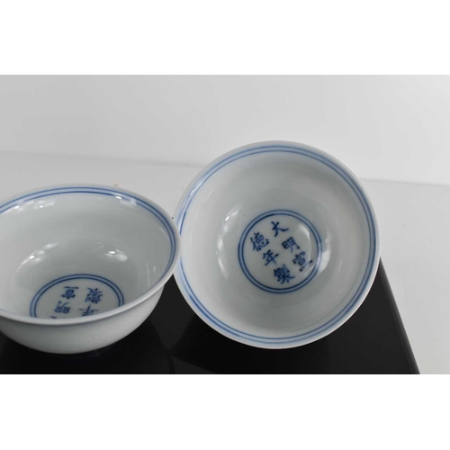 287 - A pair of Chinese Ming Xuande blue & white porcelain bowls with period marks, each of steep sided ci... 