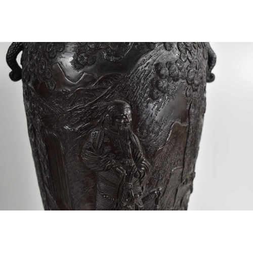 294 - A pair of 19th century Japanese bronze vases, cast in detail to depict Japanese Warriors in traditio... 