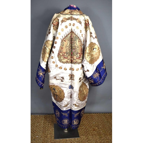 295 - A late Qing dynasty Chinese Daoist silk robe with lilac damask ground, elaborately decorated with go... 