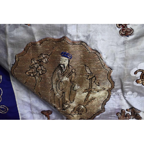 295 - A late Qing dynasty Chinese Daoist silk robe with lilac damask ground, elaborately decorated with go... 