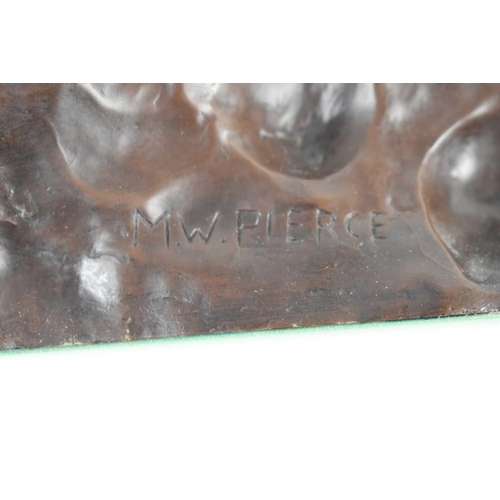 297 - A pair of bronzed resin tigers, each signed to the back M. W. Pierce.