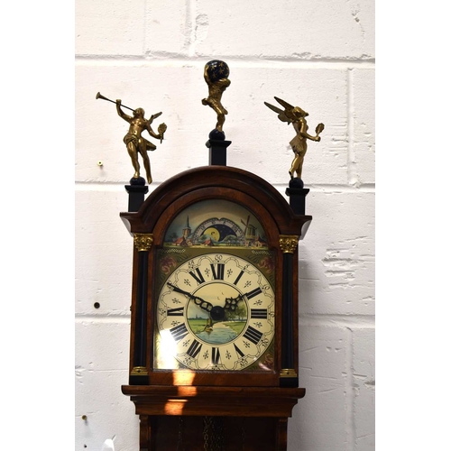 299a - A 20th century Dutch burr walnut wall clock with painted dial and moon roller, the arched hood havin... 