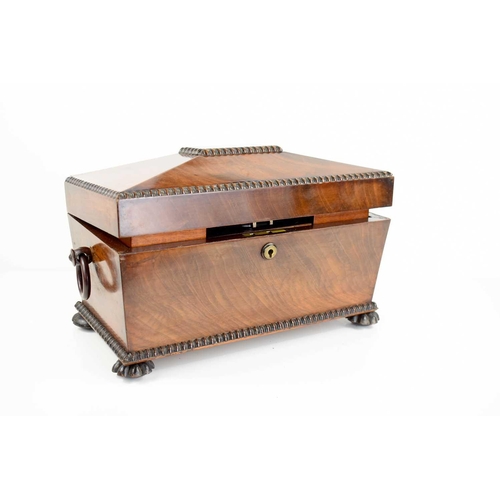 365 - A 19th century mahogany sarcophagus form tea caddy, with the original interior boxes, glass bowl and... 