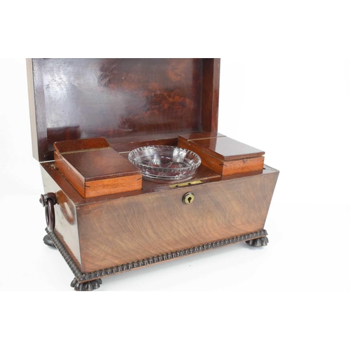 365 - A 19th century mahogany sarcophagus form tea caddy, with the original interior boxes, glass bowl and... 