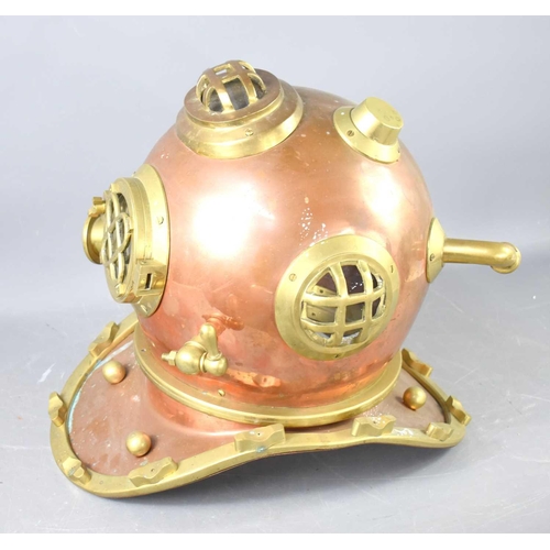 366 - A copper and brass Siebe Gorman style diver helmet.