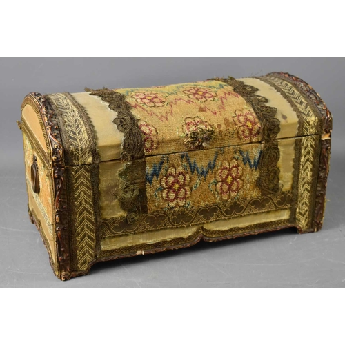 368 - A 19th century dome top casket, clad in 18th century French floral tapestry, ring form handles to th... 