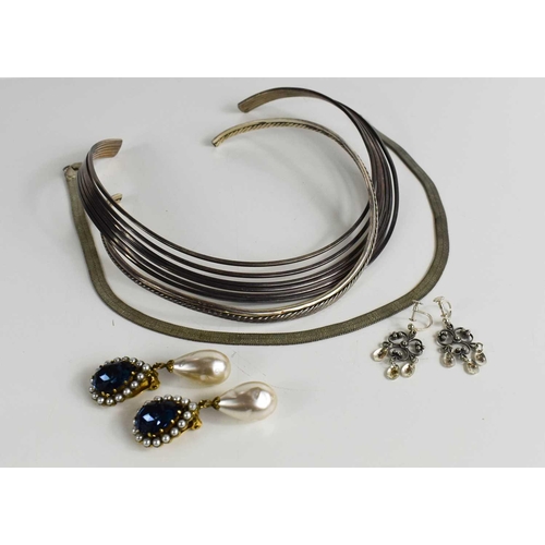 375 - A silver six strand torque necklace, a further silver coloured torque, and mesh necklace with Greek ... 