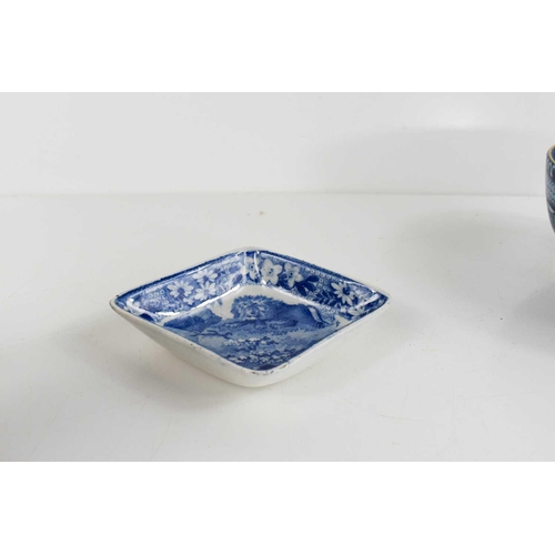 40 - A 19th century blue and white lozenge form dish depicting a lion, together with a miniature tureen d... 