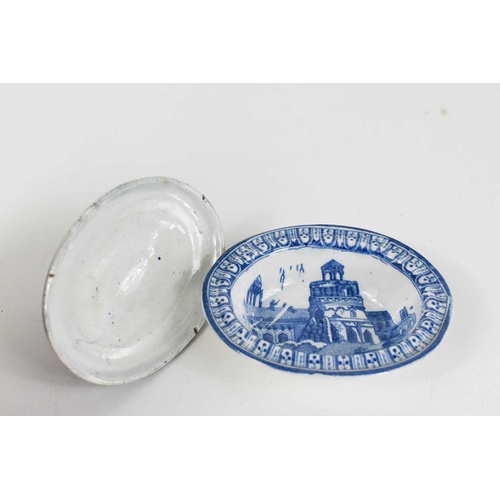 40 - A 19th century blue and white lozenge form dish depicting a lion, together with a miniature tureen d... 