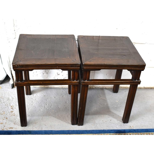 490 - A pair of Chinese jardiniere stands with bamboo style legs and rails.