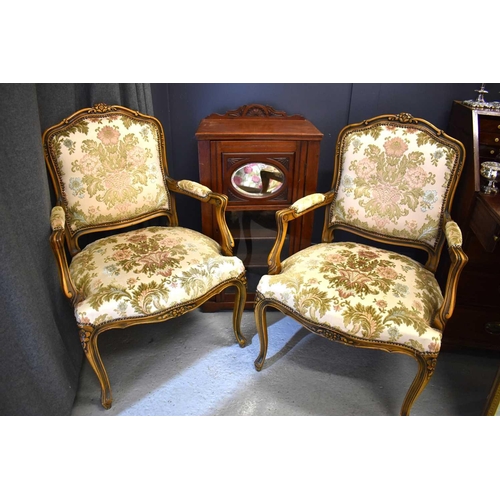 496 - A pair of French style bedroom chairs with floral upholstery together with an Edwardian mahogany mus... 