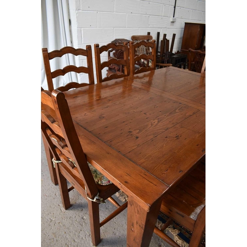 497 - The Irish Coast Collection extendable dining table and matching set of eight chairs.