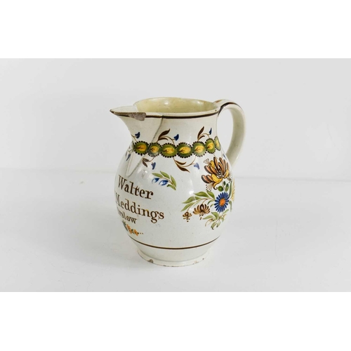 80 - A Leeds creamware jug, to Walter Meddings, Orslow, painted with floral decoration in green, yellow a... 