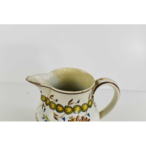 80 - A Leeds creamware jug, to Walter Meddings, Orslow, painted with floral decoration in green, yellow a... 