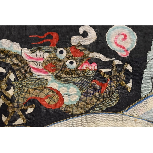 280 - A Chinese embroidered panel, depicting two four claw dragons under the flaming pearl circa 1910, 33 ... 