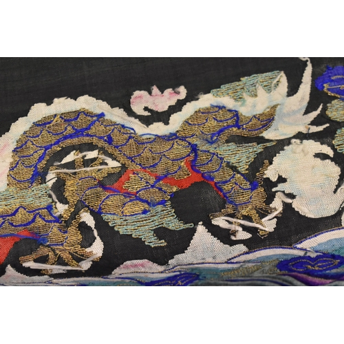 280 - A Chinese embroidered panel, depicting two four claw dragons under the flaming pearl circa 1910, 33 ... 