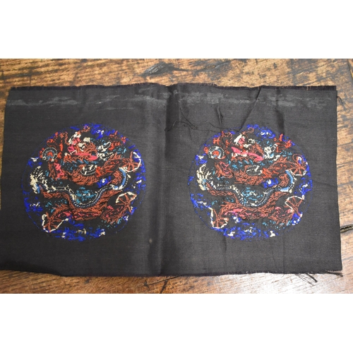 273 - A collection of 19th century and later Chinese silk fabrics to include roundels from a Chao Fu forma... 