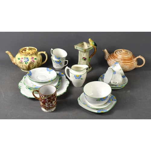 125 - A 1930s part tea service together with an Arthur Wood teapot, a Burleigh ware style jug and other it... 