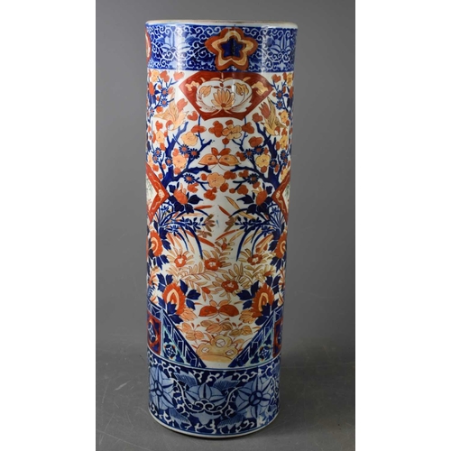 129 - A Japanese Imari umbrella stand, depicting birds amidst flowers and foliage, 62cm high. A/FCrack run... 