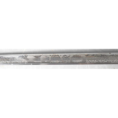 18 - A George VI ceremonial sword by Wilkinson Sword, retailed by Boyd Cooper, 12 Briton Street, No 69522... 