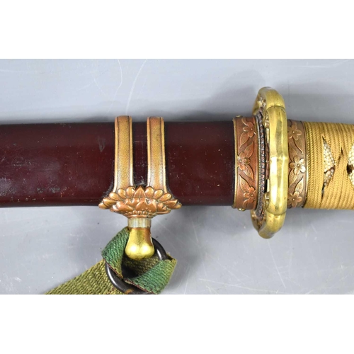 19 - A WWII period Japanese officers Shin Gunto sword with rayskin tsuka wrapped with cord binding, gilt ... 