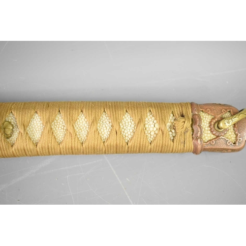 19 - A WWII period Japanese officers Shin Gunto sword with rayskin tsuka wrapped with cord binding, gilt ... 