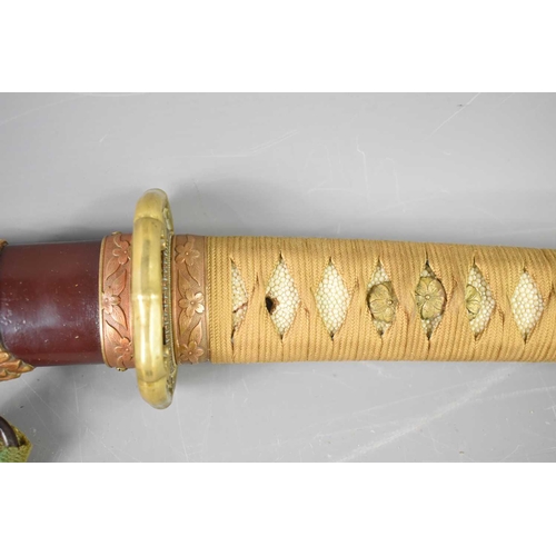 19 - A WWII period Japanese officers Shin Gunto sword with rayskin tsuka wrapped with cord binding, gilt ... 