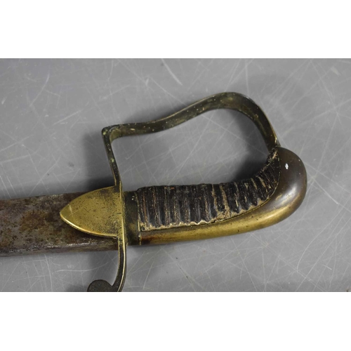 20 - An 18th century 1796 pattern cavalry officers sword, single bar hand guard with leather grip, with t... 