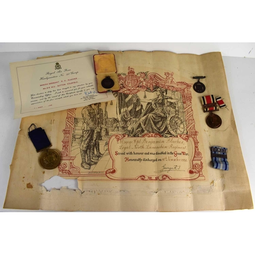 22 - A group of militaria and ephemera to include a Special Constabulary faithful service medal awarded t... 