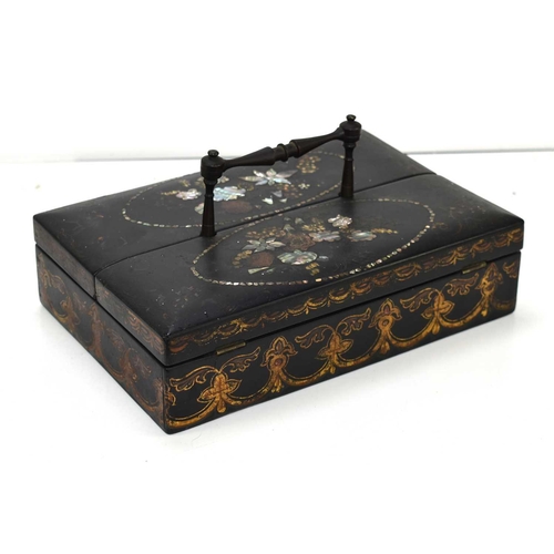 24 - A late Victorian ebonised stationary box with mother of carrying handle and pearl inlay to the top, ... 