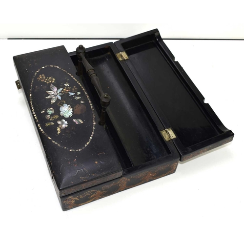 24 - A late Victorian ebonised stationary box with mother of carrying handle and pearl inlay to the top, ... 