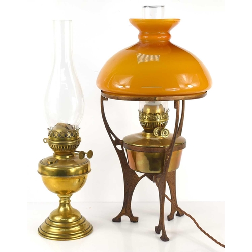 26 - An Art Nouveau style paraffin lamp later converted to electric, together with a brass oil lamp.