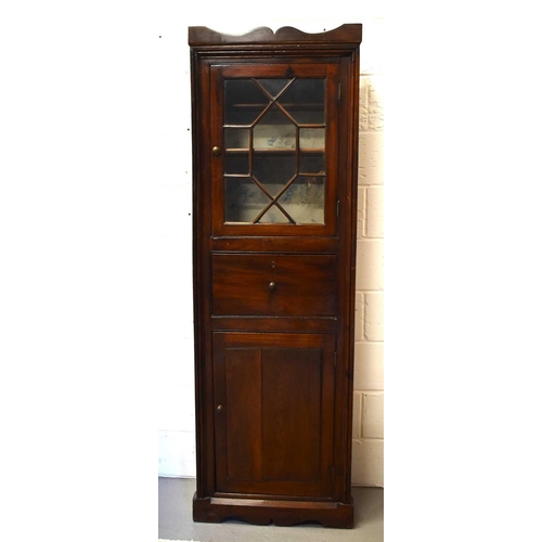 411 - An 18th century oak secretaire cabinet, the upper astragal glazed door enclosing two shelves and lin... 