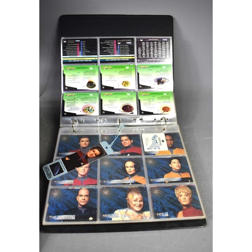 72 - A group of Star Trek Voyager memorabilia to include a limited edition jumper to commemorate the laun... 