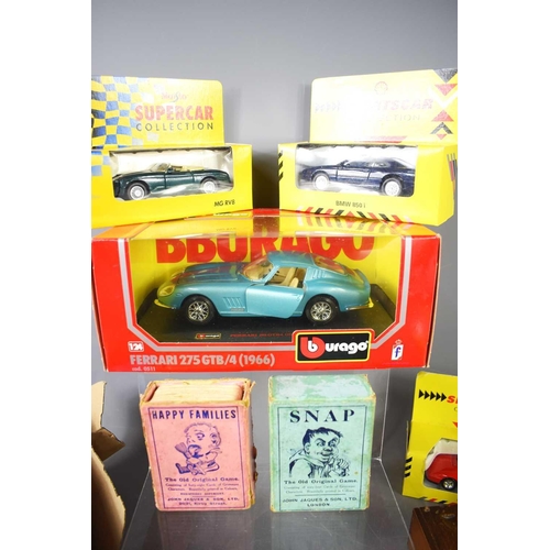 78 - A collection of vintage model vehicles comprising a Burago Ferrari 275 GTB/4 (1966), 1:24, boxed, el... 